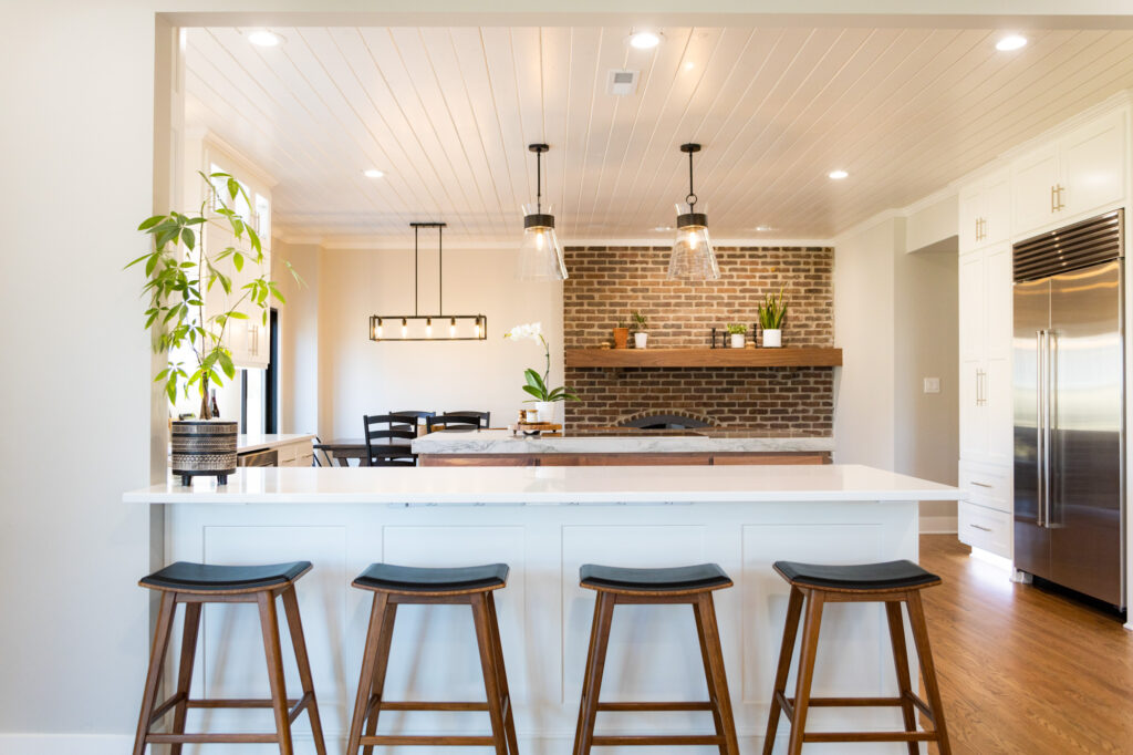 A recent kitchen remodel in Shawnee, KS with a bright, open, floorplan that seamlessly connects to the dining room.