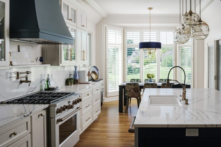 an early 2000s home update featuring a newly remodeled kitchen with large island